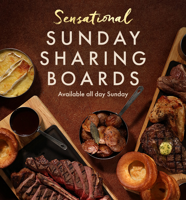 Sunday Lunch Sharing Board available all day Sunday with roast meats, Yorkshire puddings, mash, gravy and vegetables.